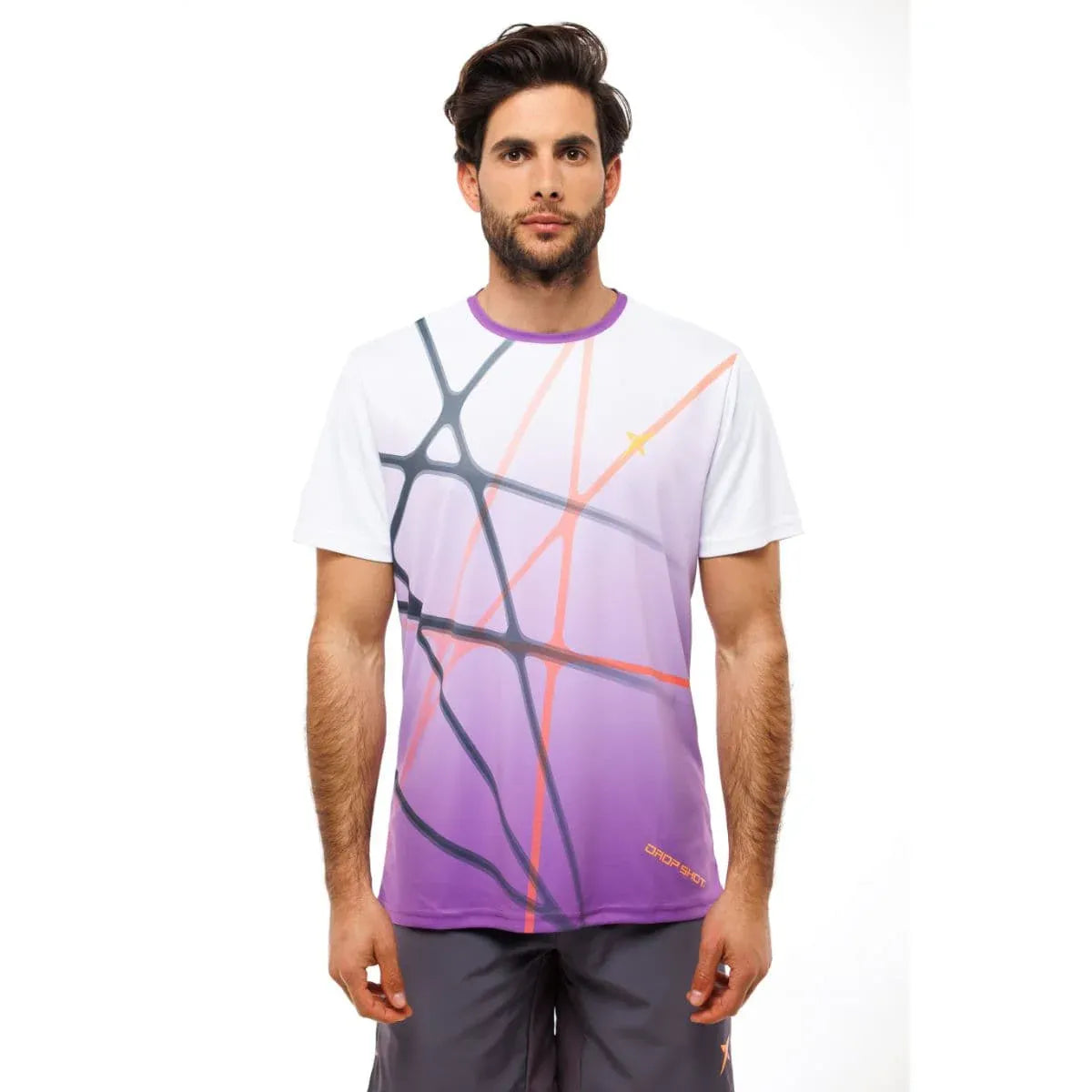 Man wearing a white t-shirt with a colorful abstract design on a white background